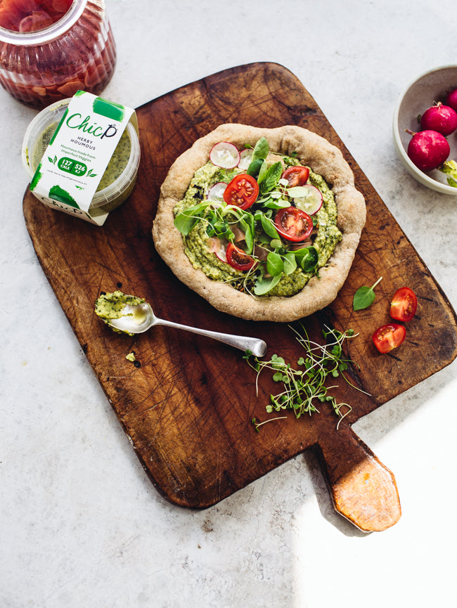 Vegetarian and vegan pizza made with ChicP's spinach and parsley hummus