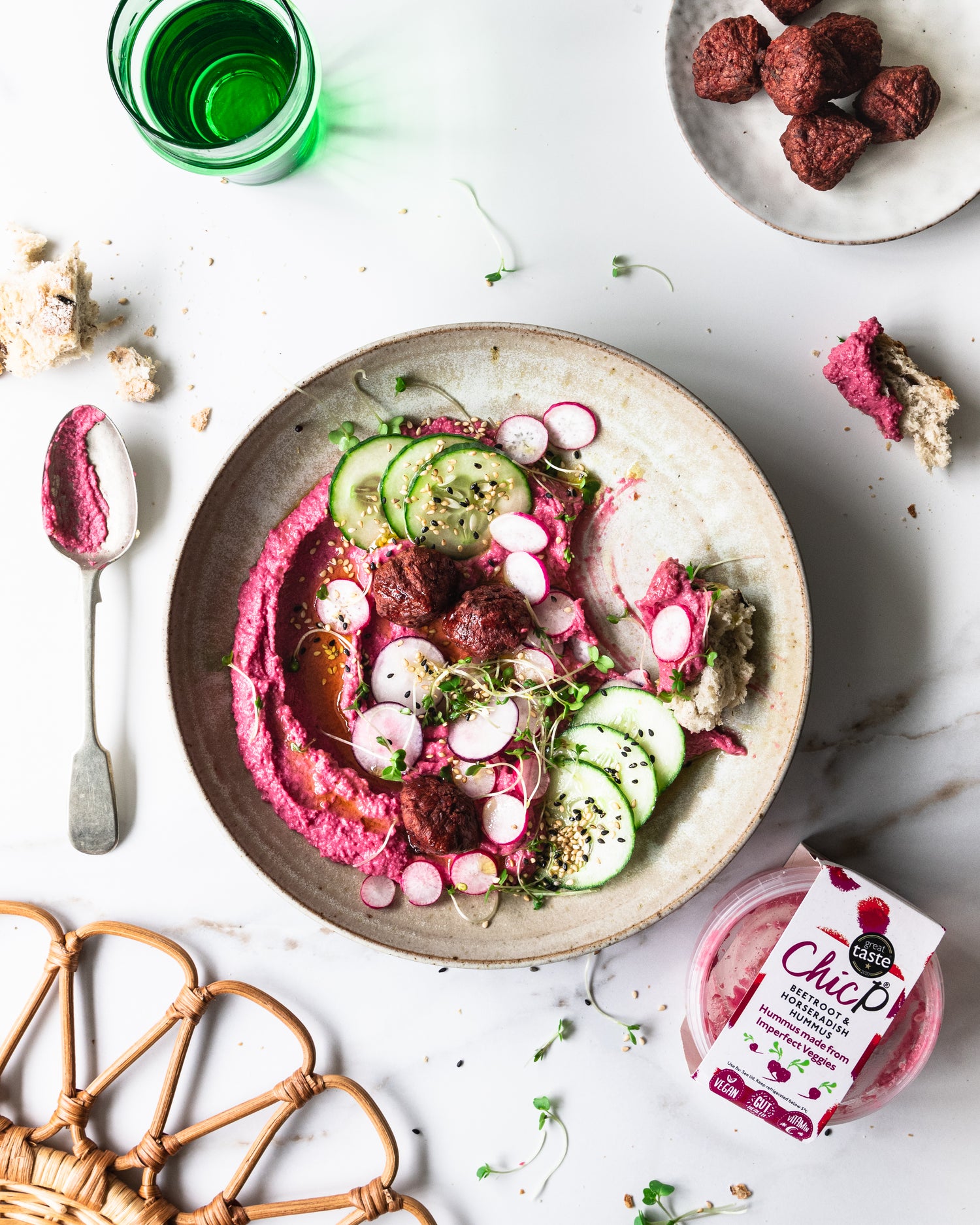Bowl with vegetarian food including ChicP Beetroot and horseradish hummus